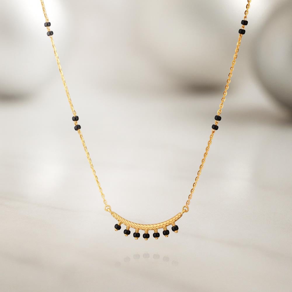 Minimal Grace Gold Mangalsutra
Minimal Grace Gold Mangalsutra