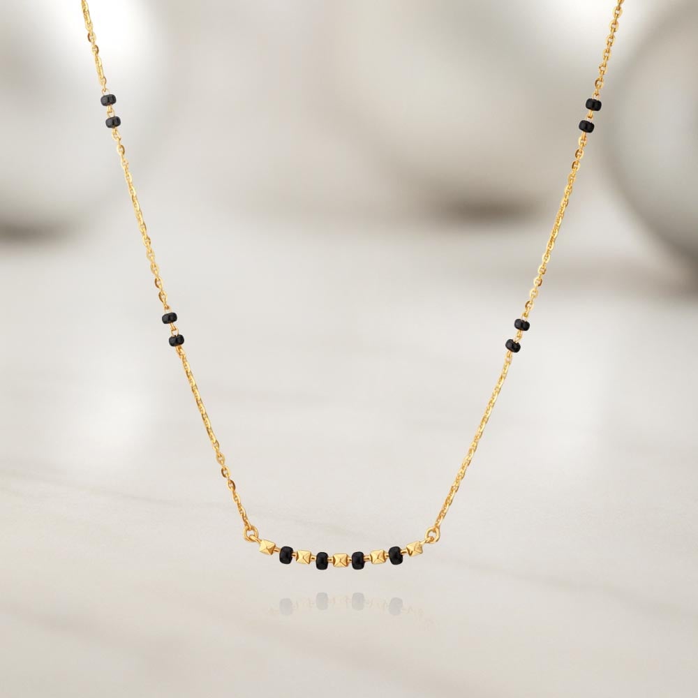 Timeless Minimal Gold Mangalsutra
Timeless Minimal Gold Mangalsutra
