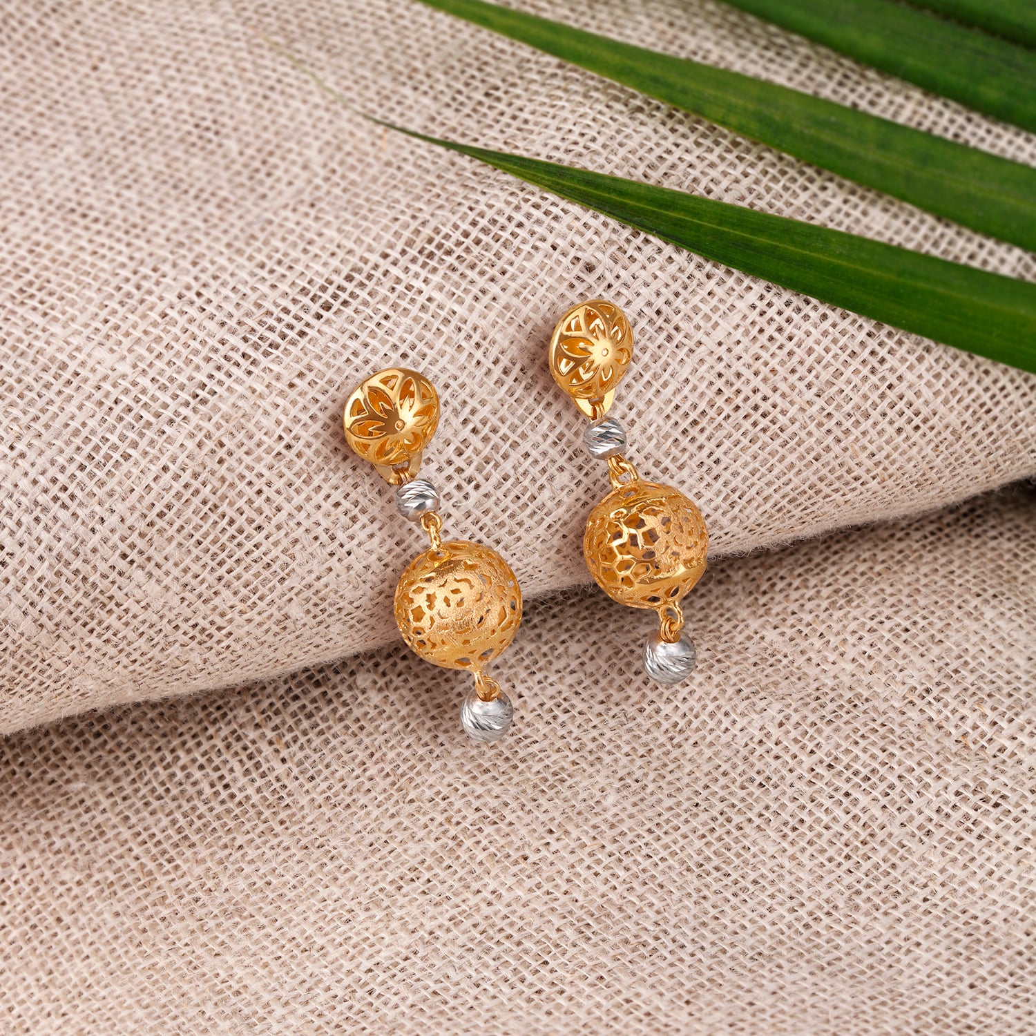 Brilliant Dual Toned Gold Drop Earrings
Brilliant Dual Toned Gold Drop Earrings