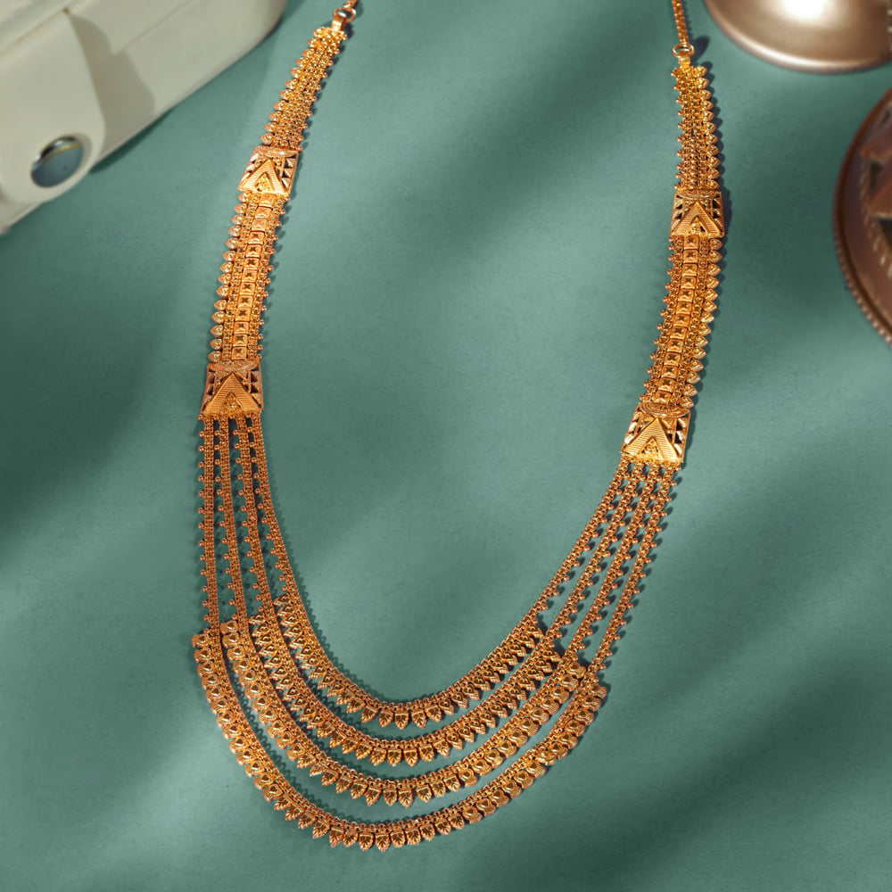 Gleaming Yellow Gold Four Strand Haaram
Gleaming Yellow Gold Four Strand Haaram