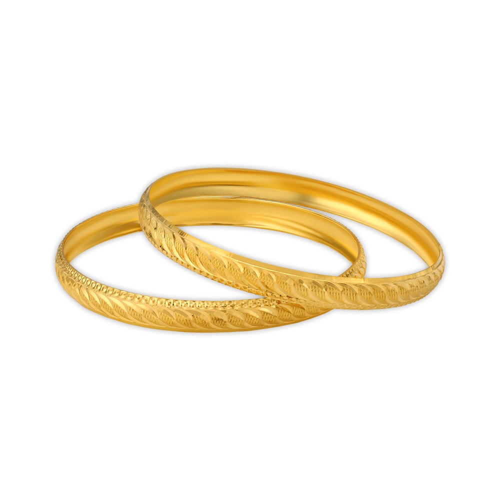 Arresting Yellow Gold Etched Bangles
Arresting Yellow Gold Etched Bangles