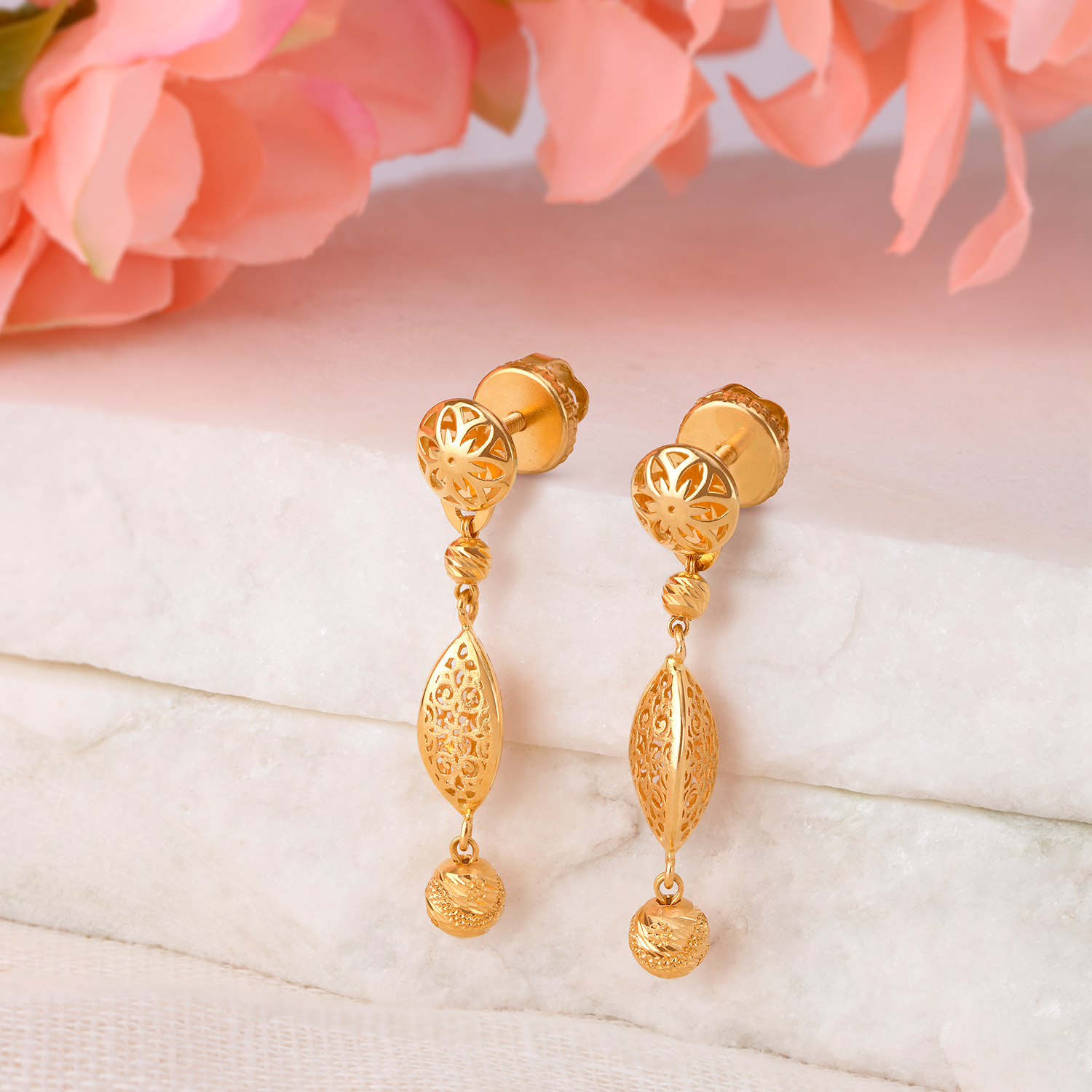 Versatile Glistening Gold Drop Earrings
Versatile Glistening Gold Drop Earrings