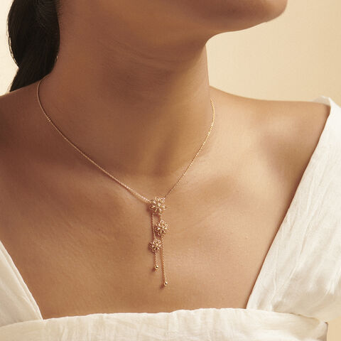 Radiant Floral Gold Lariat Necklace