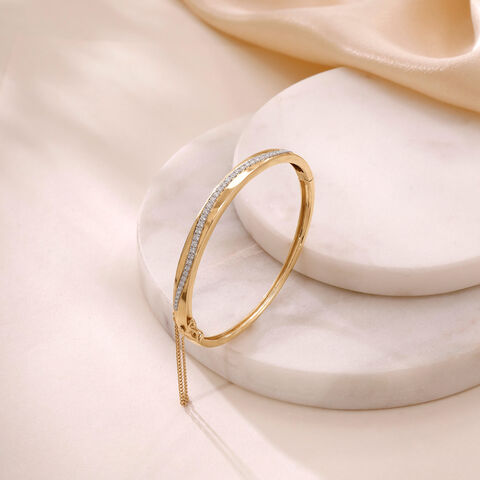 Sleek Curve Gold Bangle