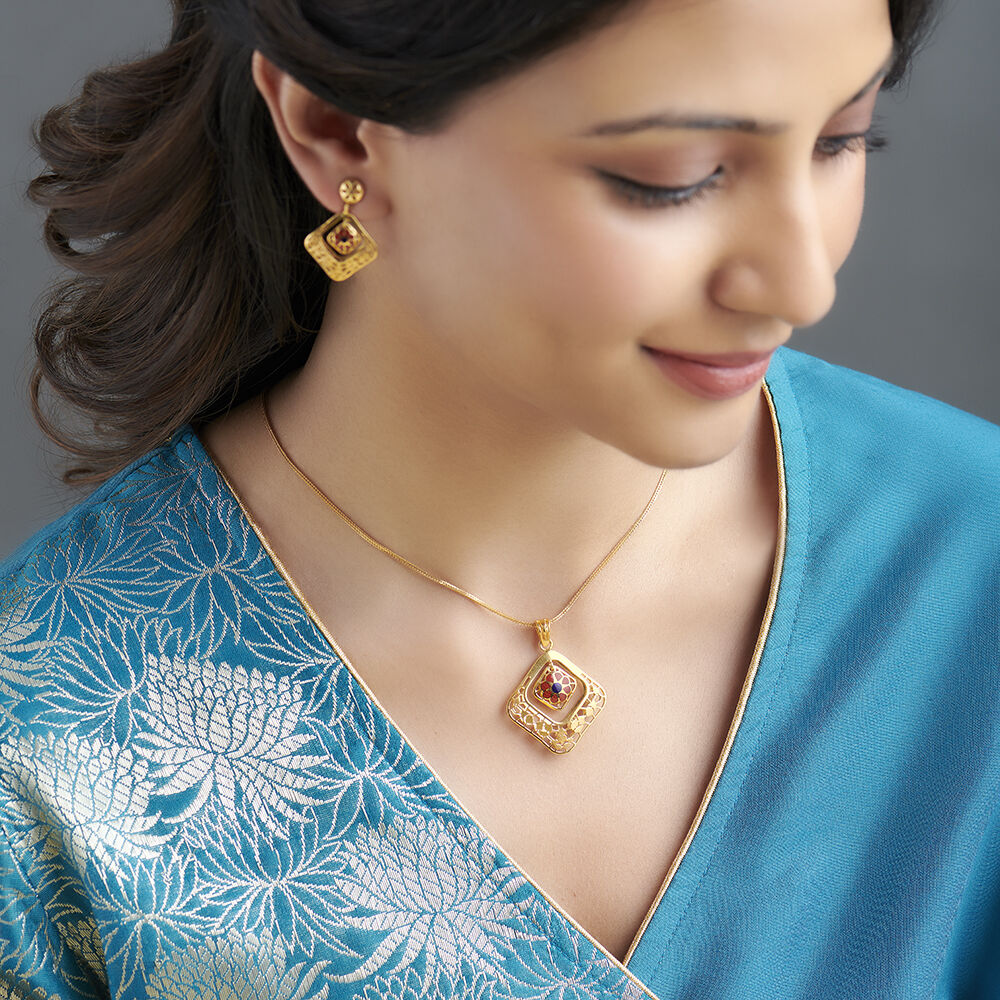 Gold pendant designs tanishq discount