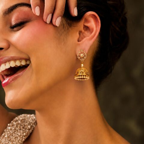 Traditional Alluring Gold Jali Work Jhumkas