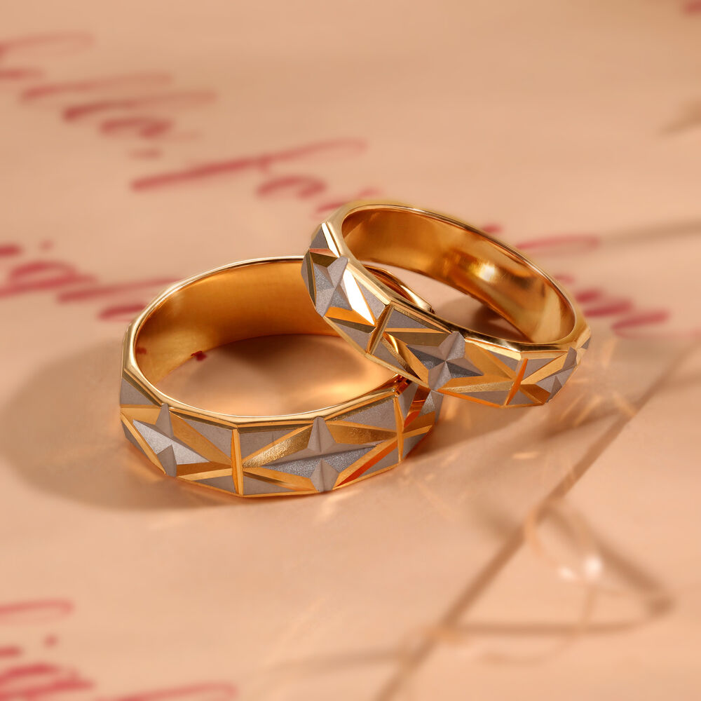 Gold rings for couples tanishq hot sale