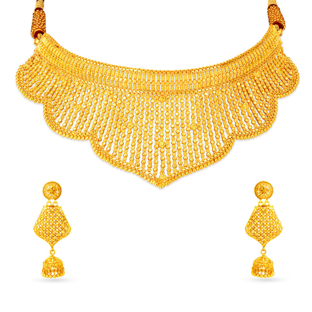Gold set on sale tanishq with price