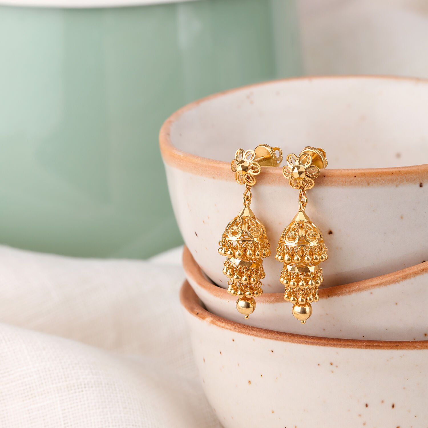 Gold jhumkas tanishq hotsell