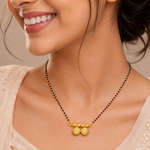 Eccentric Gold Pendant