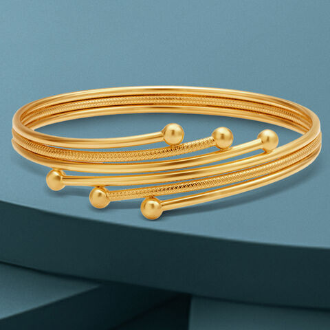 Artistic Gold Bangle