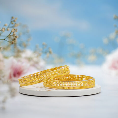 Ornate Gold Bangles with Diamonds