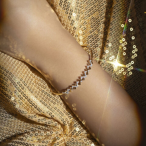 Rhythmic Twist Gold & Diamond Bangle