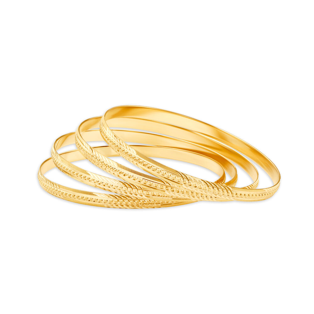 Gold bangles set of 4 tanishq sale