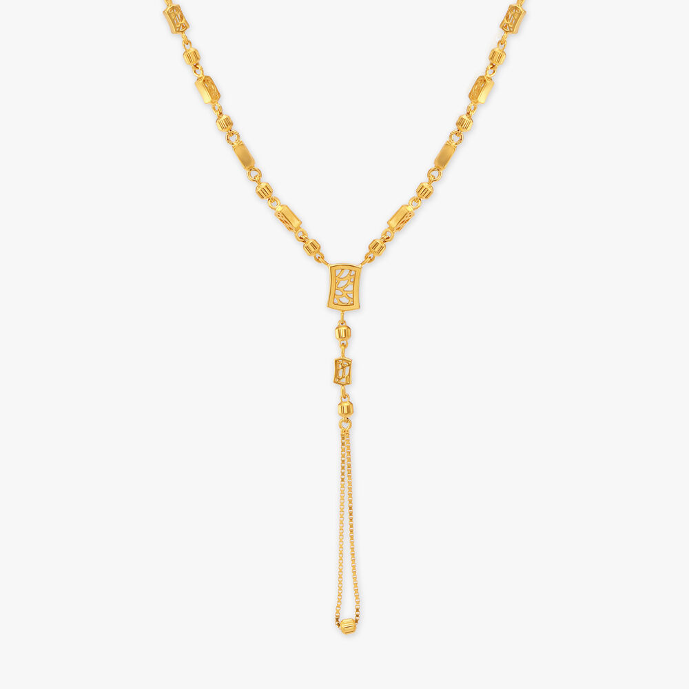 Intricate Gold Pendant with Chain