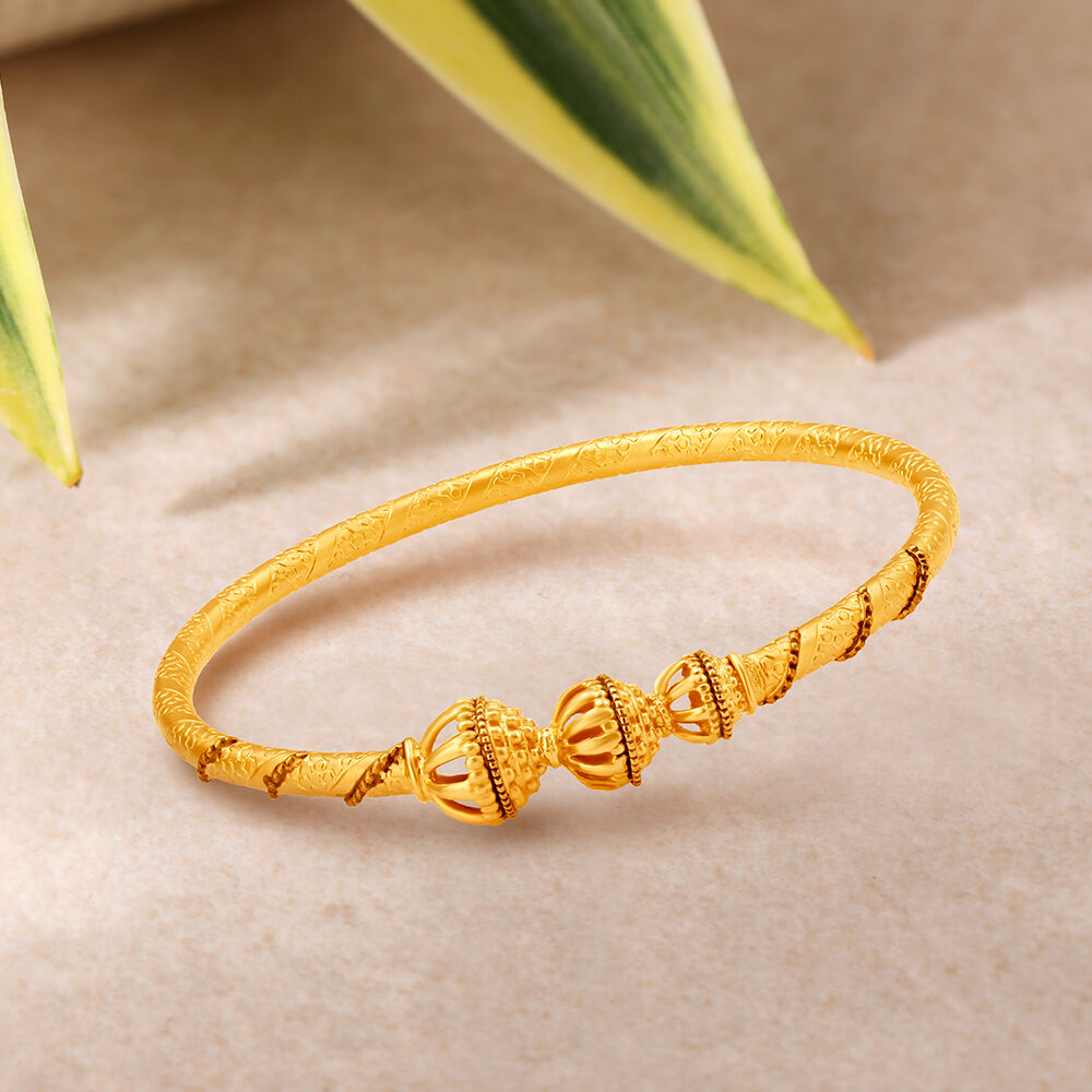 Royal tanishq shop gold kangan designs
