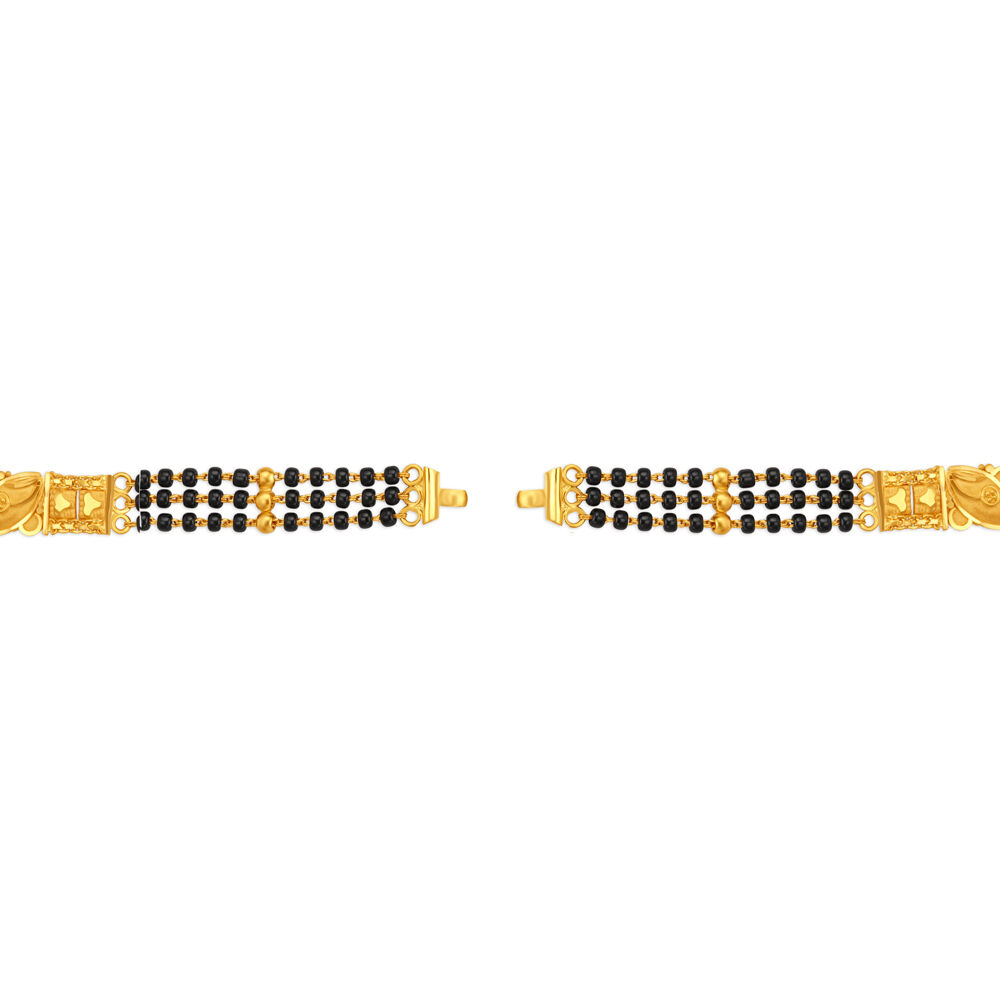 Arresting Traditional Black Bead Gold Mangalsutra