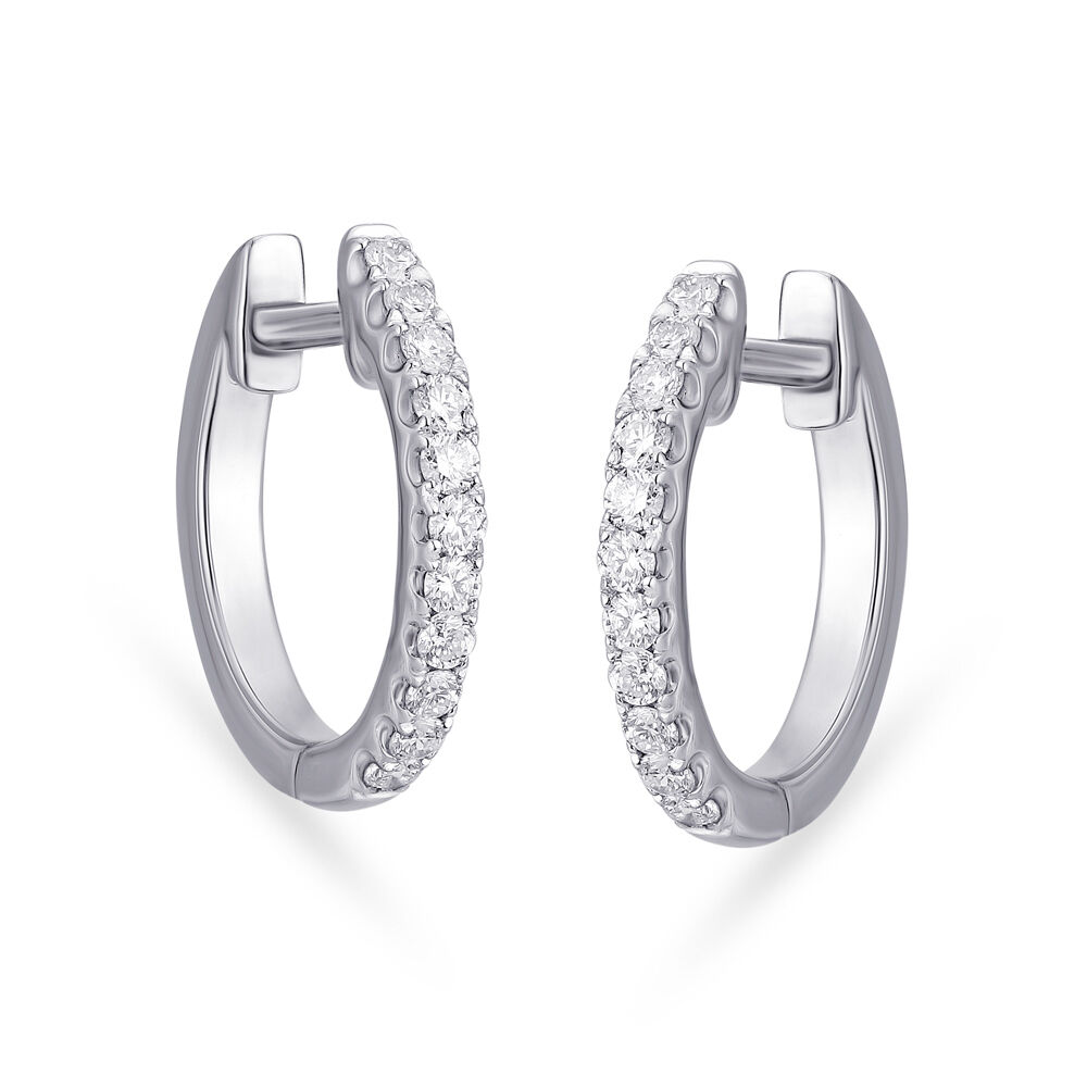 Platinum huggie earrings on sale