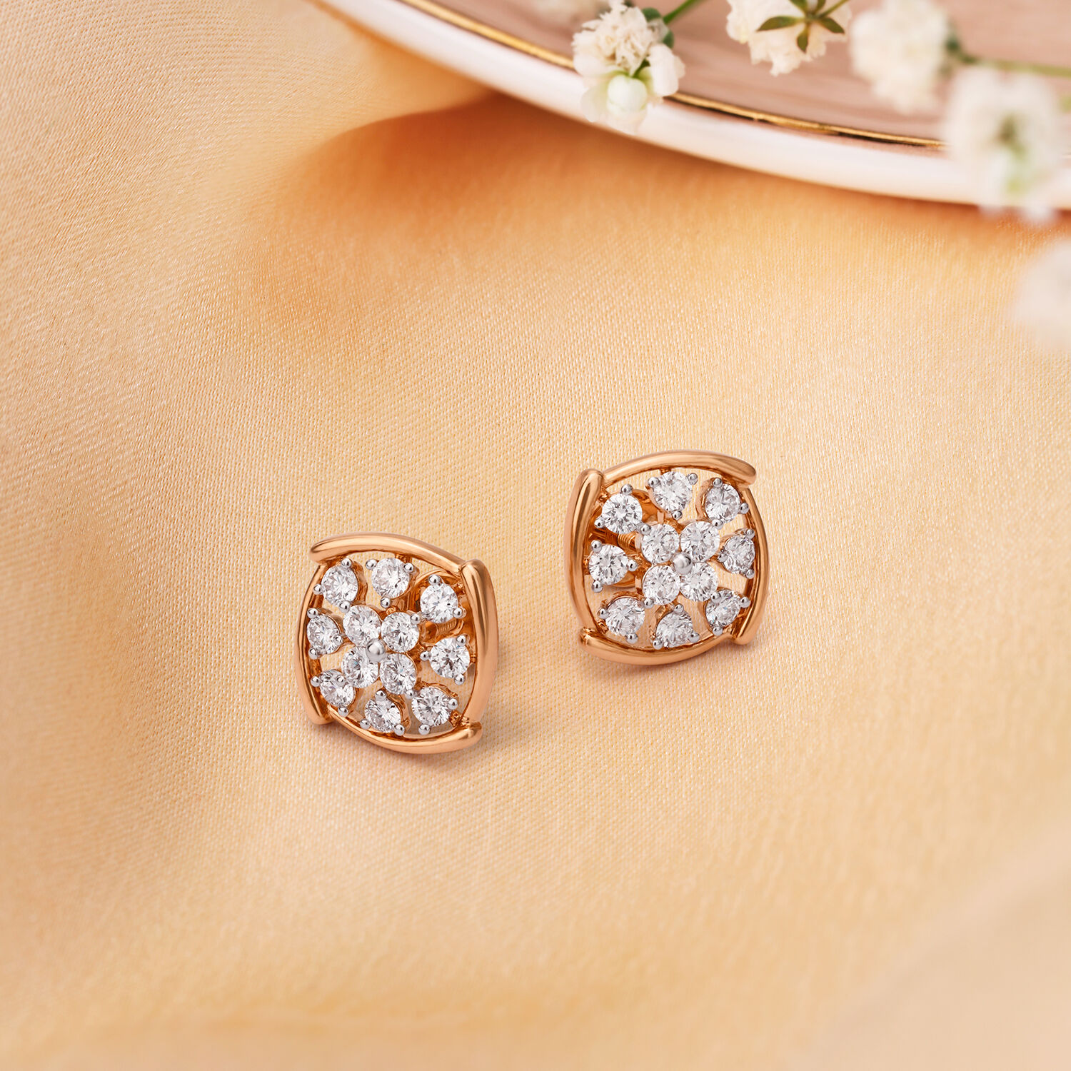 Tasteful Floral Diamond Stud Earrings Tanishq Online Store