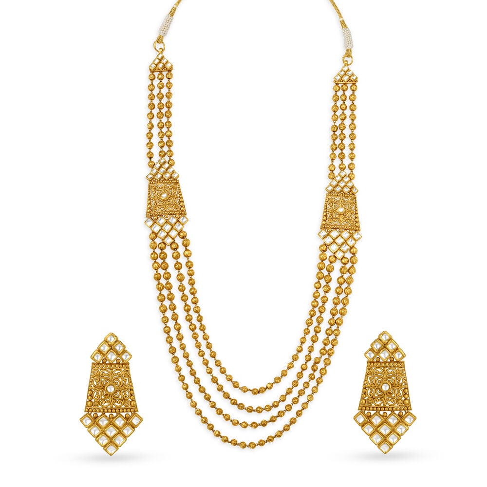 Tanishq online gold necklace set hotsell