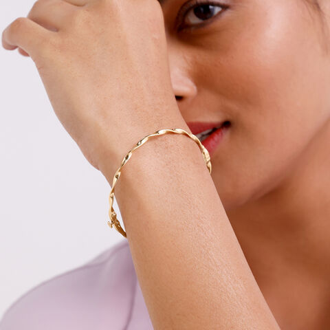 Twisted Radiant Gold Bangle