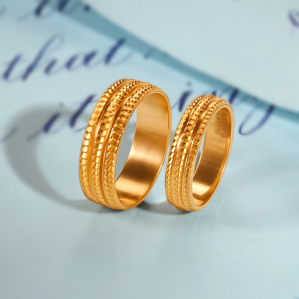 Couple rings gold tanishq top