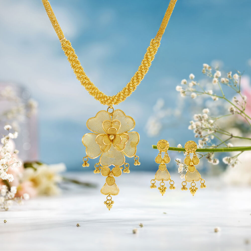 Gold sets designs by tanishq shop