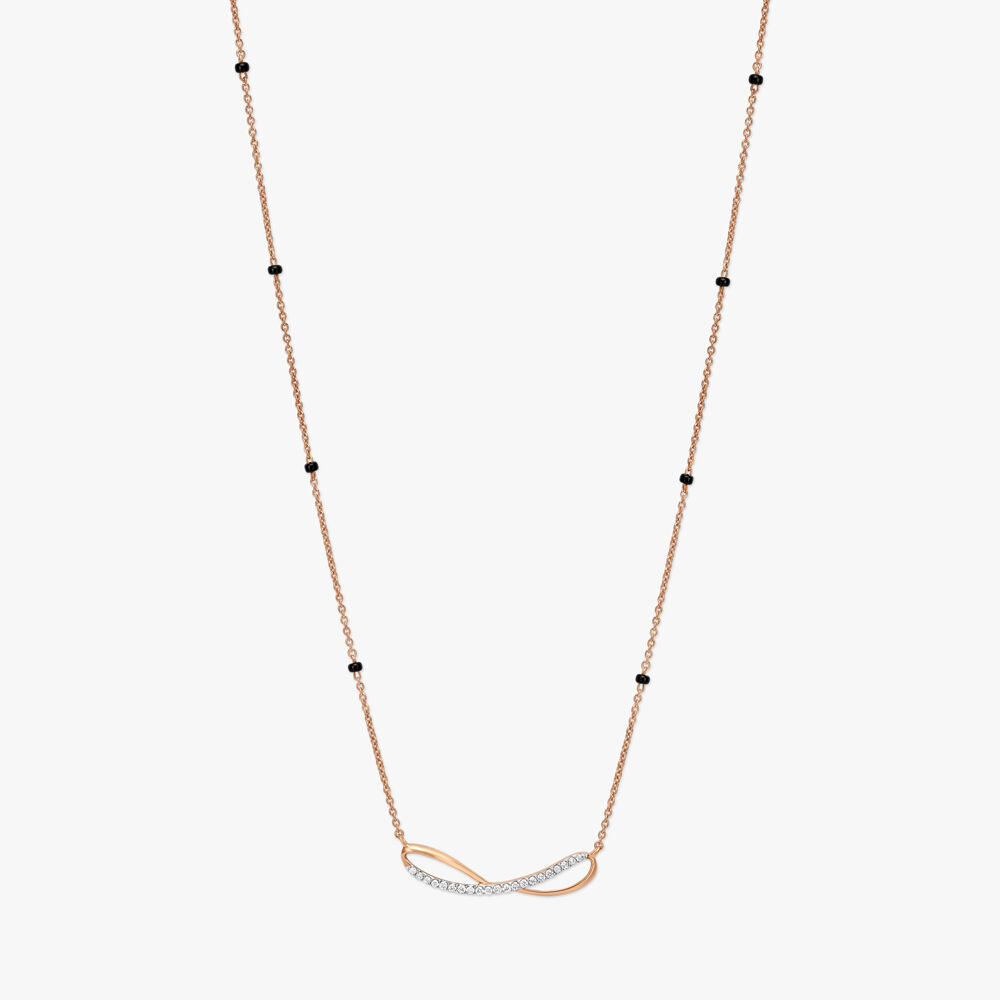 Infinity pendant gold best sale tanishq