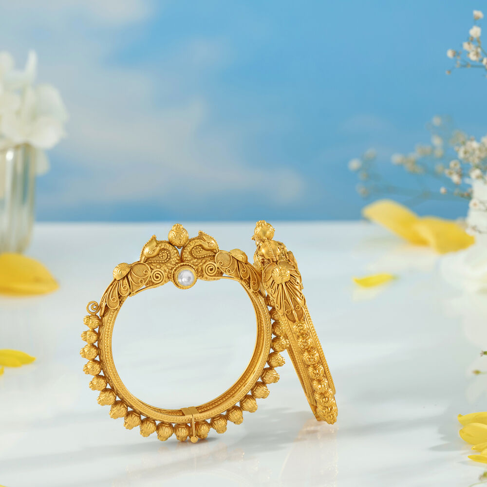 Graceful Peacock Head Gold Bangle