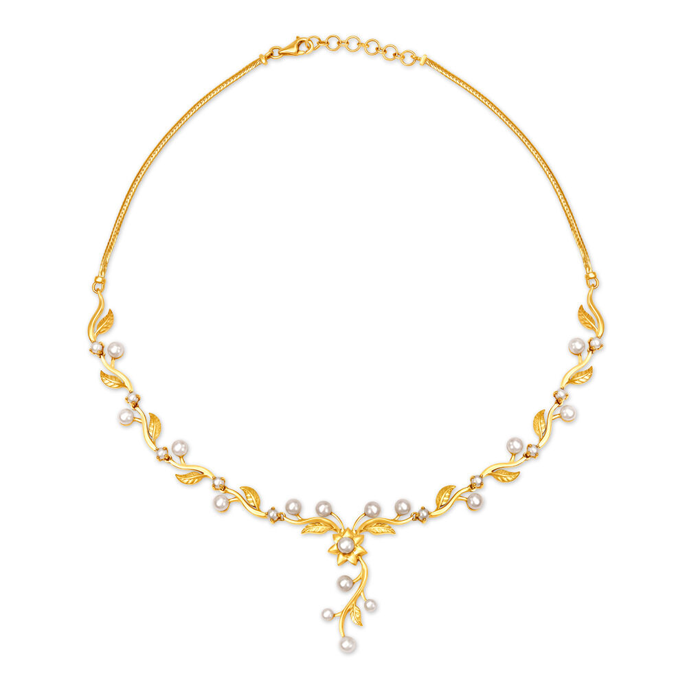 Tanishq pearl set with gold online