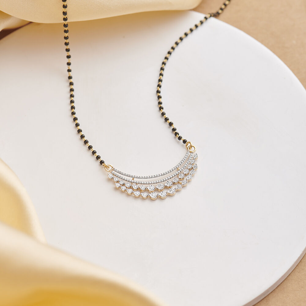 Tanishq mangalsutra store with earrings