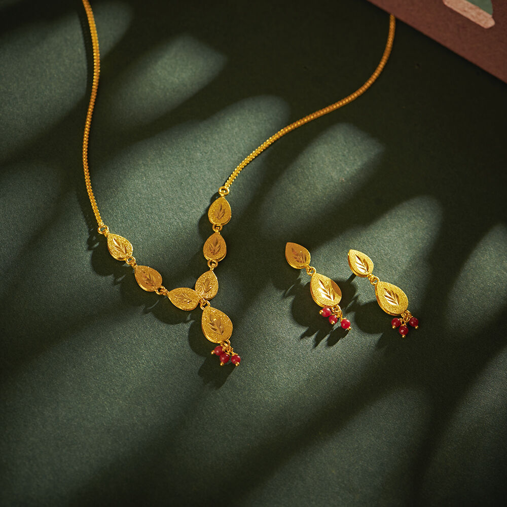 Tanishq gold pendant best sale set designs with price