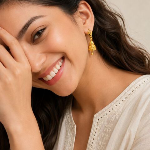 Charming Yellow Gold Swirled Jhumkas