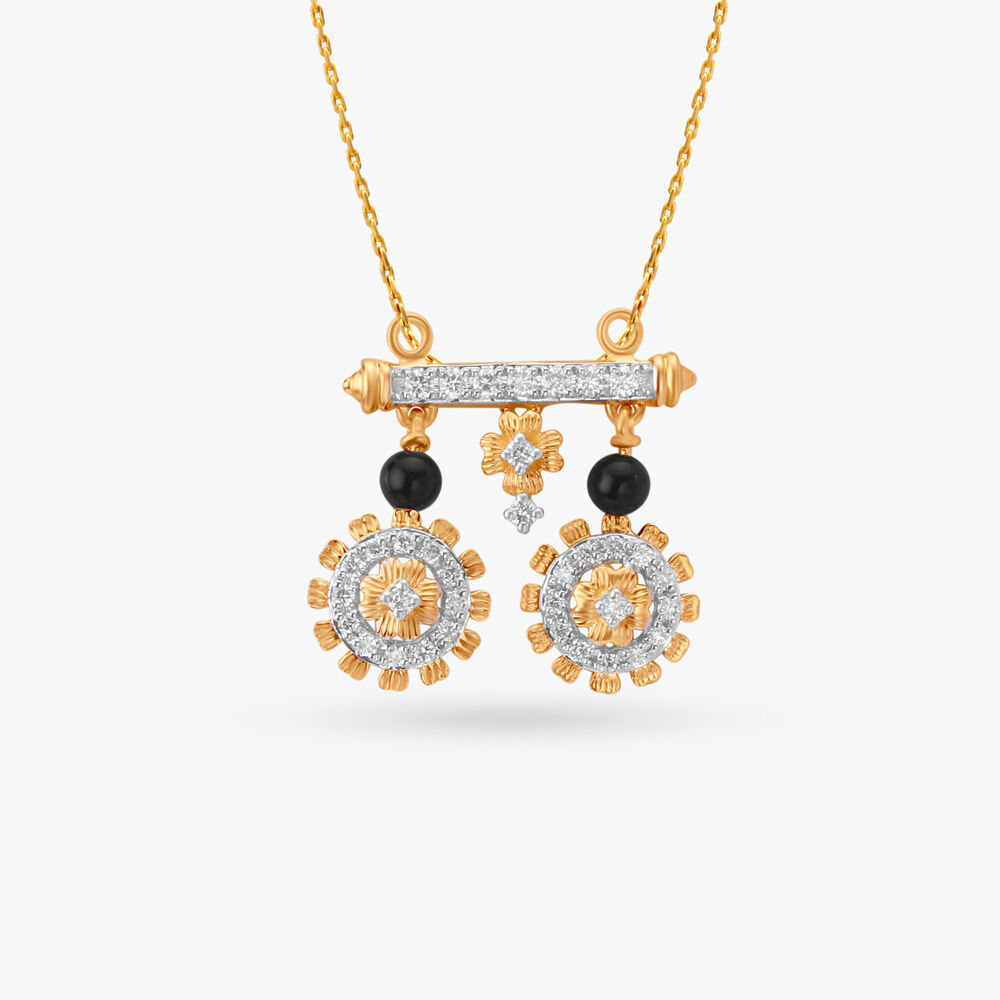 Diamond pendant price tanishq deals