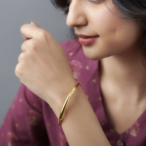 Intricate Polished Gold Bangle