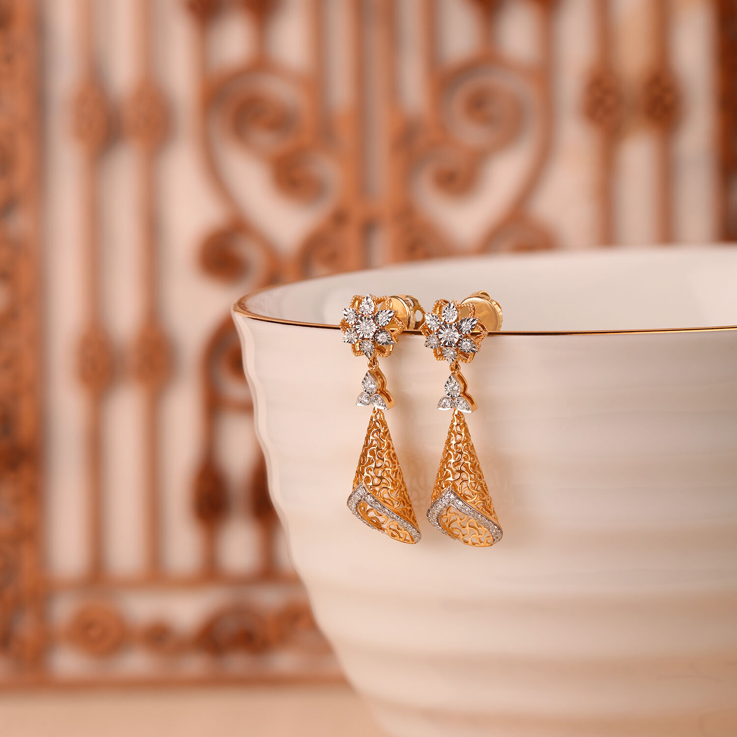 Sleek Floral Diamond Studded Jhumka Earrings