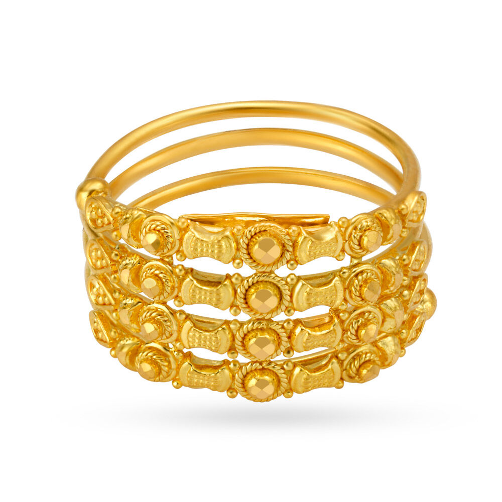 Four finger online gold ring