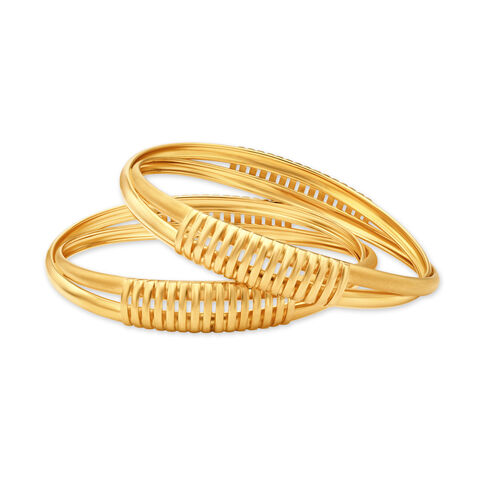 Graceful Overlap Gold Bangles