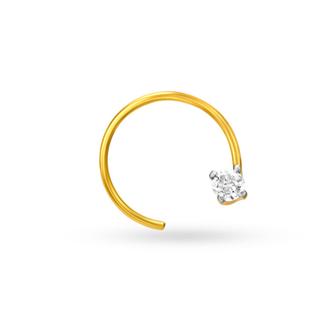 Spruce up your outfits with this minimal nose pin crafted in 18 karat yellow gold studded with diamo 