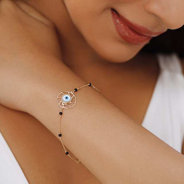 Yellow Gold Multi Charm Evil Eye Bracelet 2