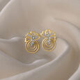 Floral Swirls 18 KTGold & Diamond Stud Earrings 