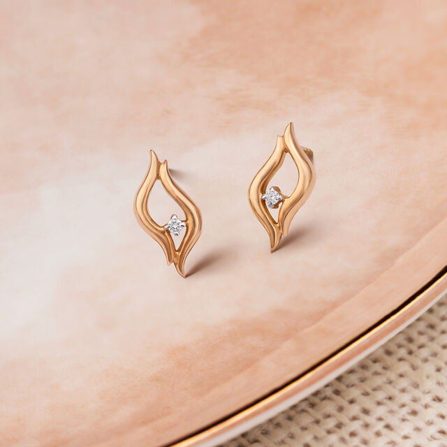 Subtle Gold and Diamond Single Stone Stud Earrings
