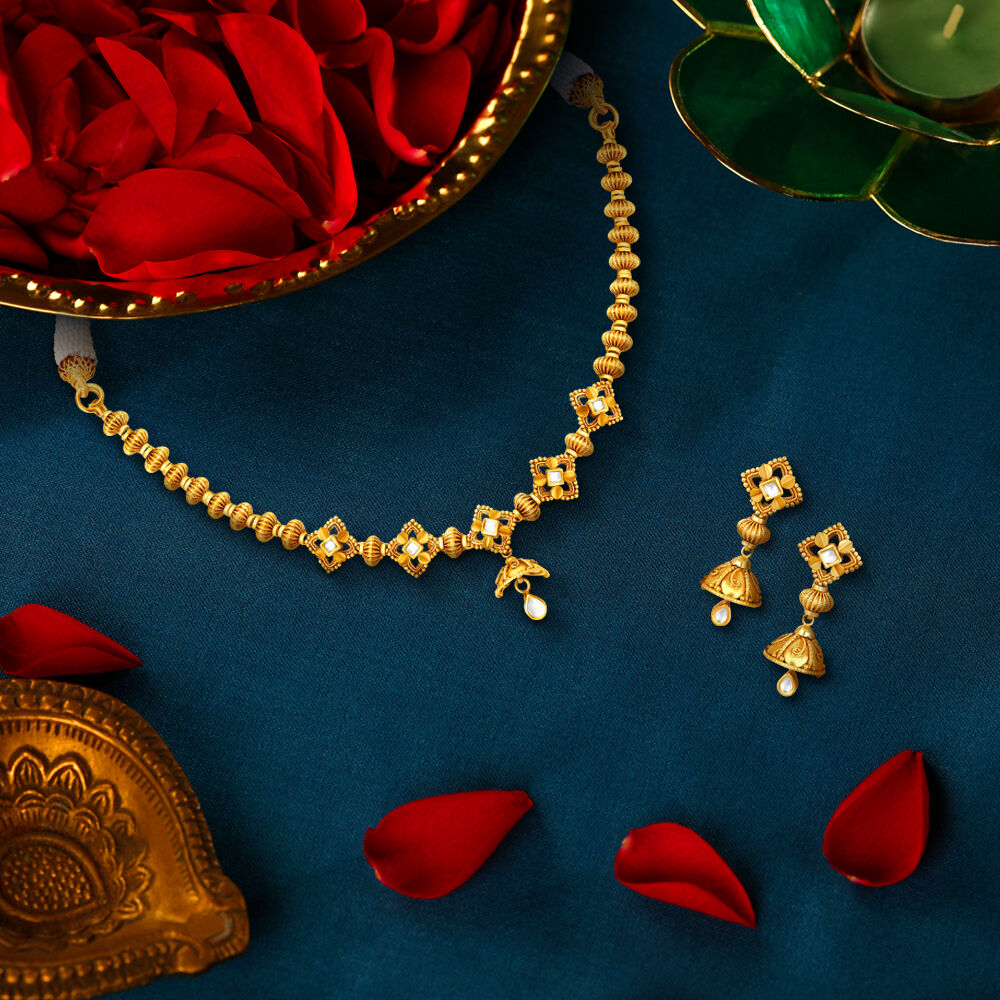 Gold necklace online tanishq hotsell