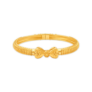 Whimsical 22 Karat Yellow Gold Bowtie Bangle