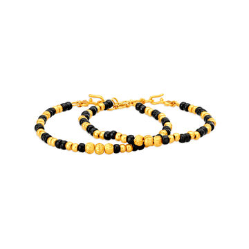 Pair of 22 Karat Yellow Gold Bracelets with Black Beads