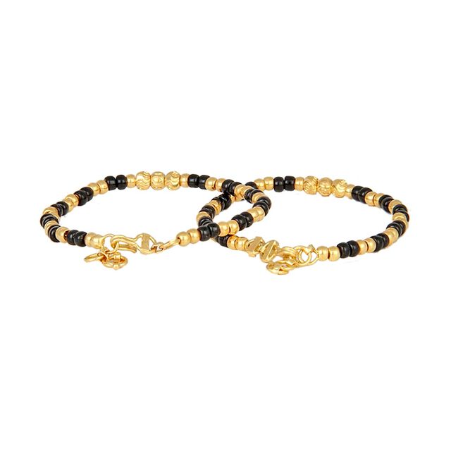 Pair of 22 Karat Yellow Gold Bracelets with Black Beads