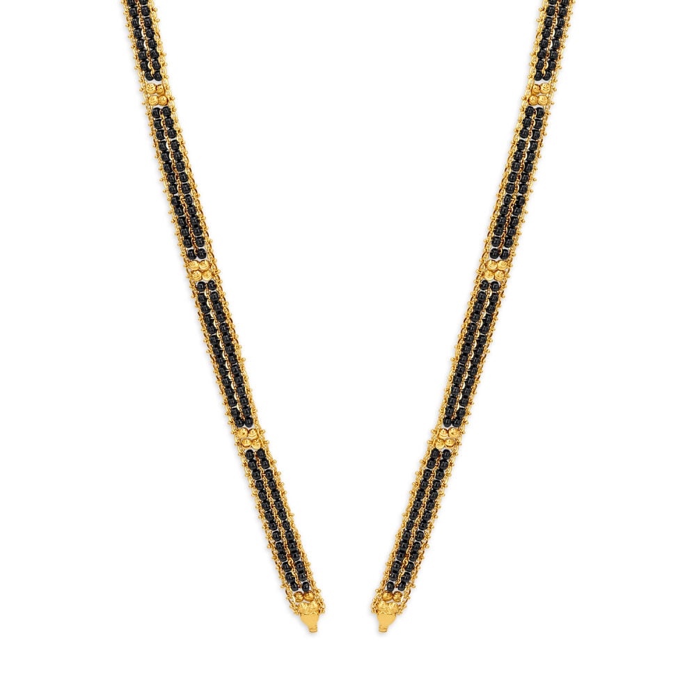 Gold mangalsutra by tanishq deals