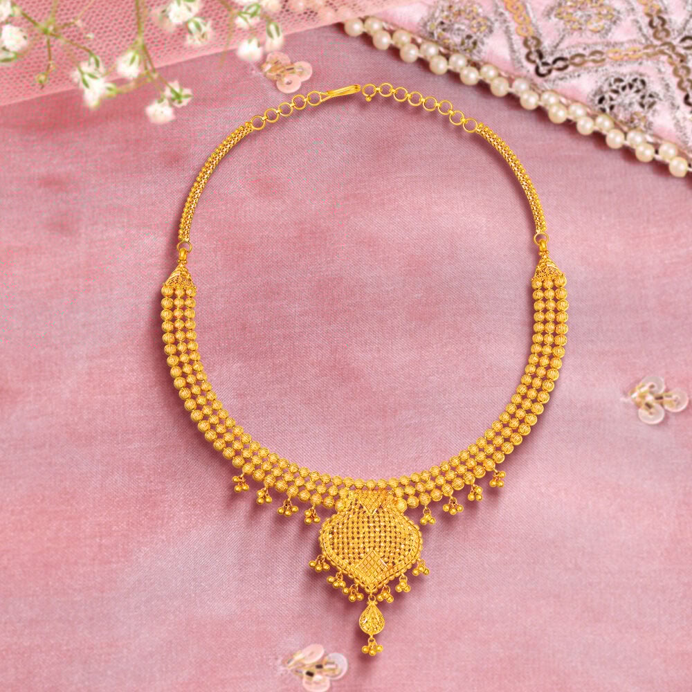 Tanishq gold necklace designs with price online