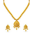 Stately Gold Nakashi Necklace Set for the Tamil Bride 