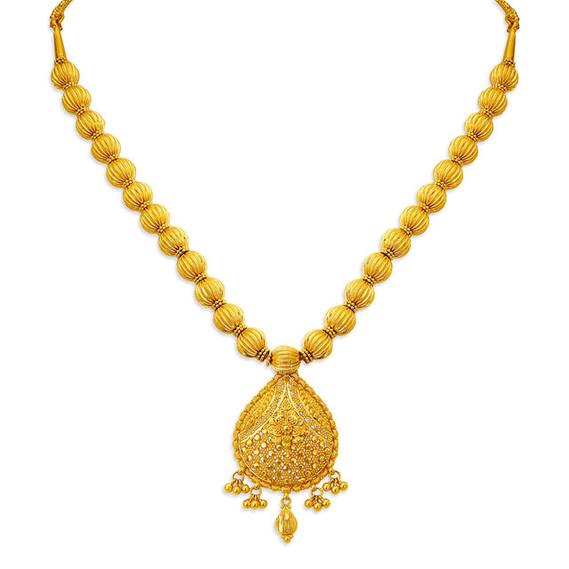Stately Gold Nakashi Necklace Set for the Tamil Bride 2